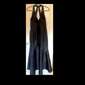 Beautiful full-length mermaid gown with leg slit.